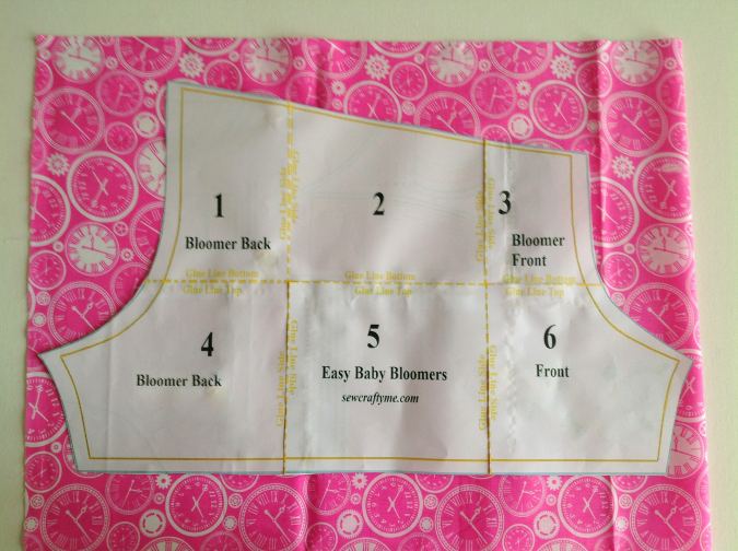 Fold the fabric to fit the width of the template and place the template over it. Mark around it and cut to get the bloomer pieces.