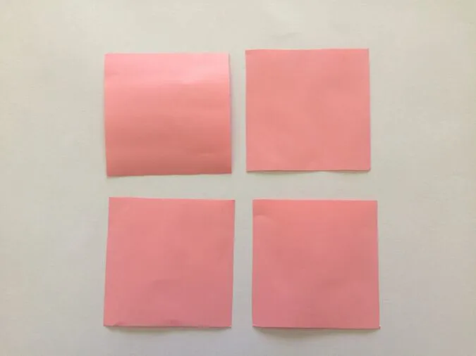 Cut four square pieces with 4 x 4- inches dimensions, from the cardstock paper for the DIY paper rose